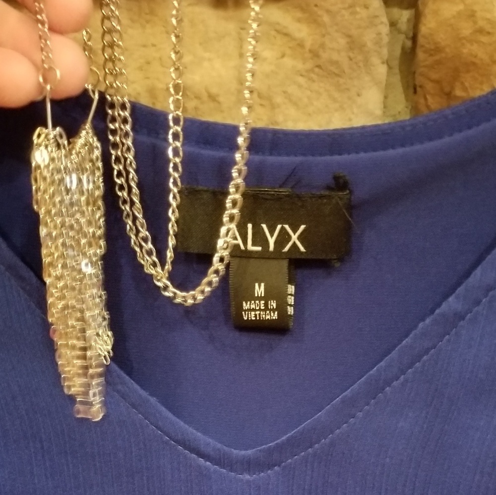 Alyx top with necklace.